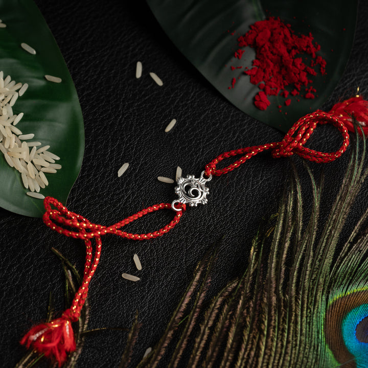 925 Sterling Silver Om Rakhi for Brother | Traditional Om Design Rakhi with Floral Frame & Red Thread