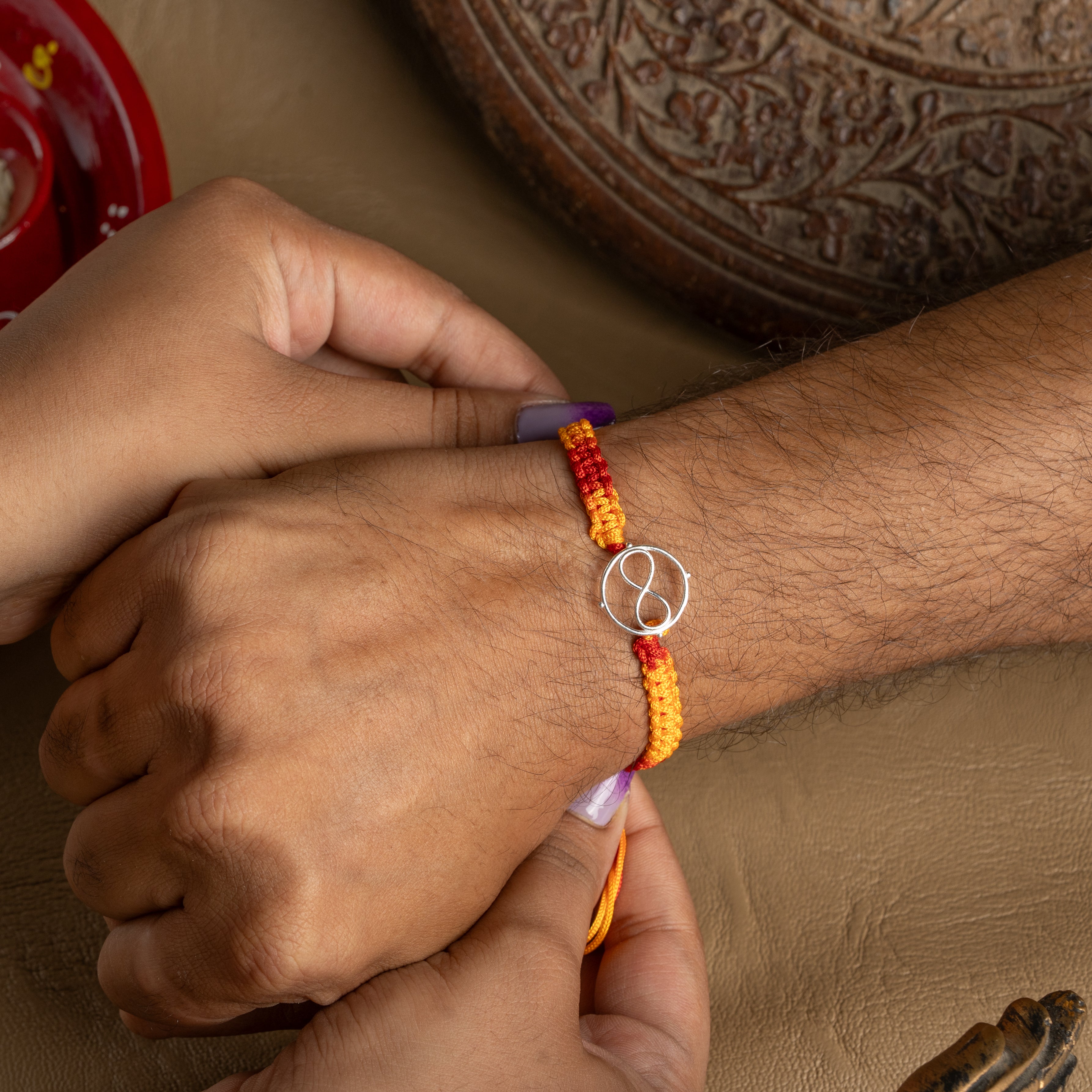 925 Silver Infinity Symbol Rakhi for Brother – Eternal Bond Raksha Bandhan Thread in Yellow & Orange