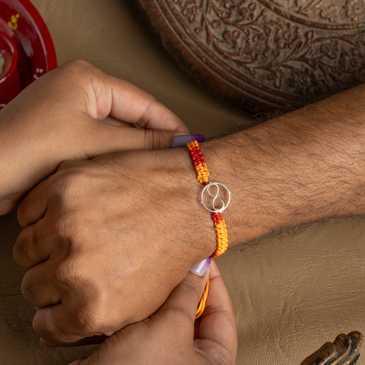 925 Silver Infinity Symbol Rakhi for Brother – Eternal Bond Raksha Bandhan Thread in Yellow & Orange