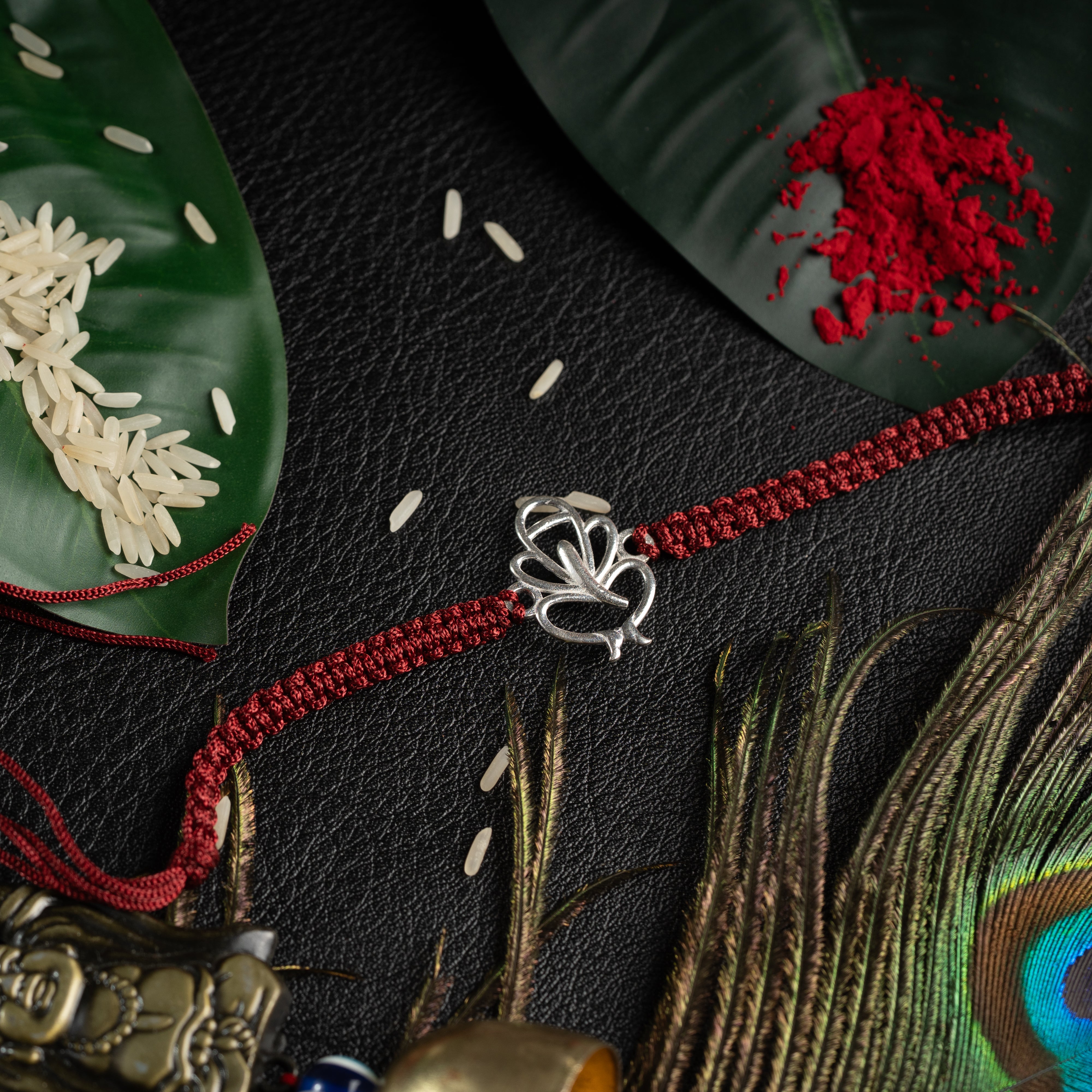 925 Sterling Silver Ganesha Rakhi for Brother | Sunray Inspired Divine Design on Maroon Thread